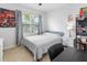 Spacious bedroom with a queen-size bed and a desk at 603 Lazio Cir, Debary, FL 32713