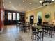 Community room with tables, chairs, and a bar at 603 Lazio Cir, Debary, FL 32713