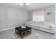Living room features a comfortable sectional sofa and coffee table at 603 Lazio Cir, Debary, FL 32713
