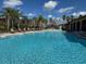 Resort-style swimming pool with lounge chairs at 603 Lazio Cir, Debary, FL 32713