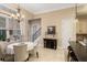 Breakfast area with table, chairs, and views to the kitchen and backyard at 6220 Cartmel Ln, Windermere, FL 34786