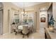 Bright dining area with table, chairs, and views to the pool and backyard at 6220 Cartmel Ln, Windermere, FL 34786