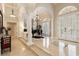 Grand entry with high ceilings, marble floors, and a piano at 6220 Cartmel Ln, Windermere, FL 34786