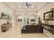 Gathering room with a large screen TV and comfortable seating at 6220 Cartmel Ln, Windermere, FL 34786