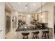 Elegant kitchen with granite countertops, custom cabinetry, and stainless steel appliances at 6220 Cartmel Ln, Windermere, FL 34786