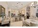 Kitchen with breakfast nook, island, stainless steel appliances, and lots of light at 6220 Cartmel Ln, Windermere, FL 34786