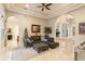 Bright living room with sectional sofa, decorative accents, and views to other areas at 6220 Cartmel Ln, Windermere, FL 34786