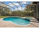 Enclosed pool and spa area with screened enclosure at 6220 Cartmel Ln, Windermere, FL 34786