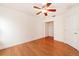 Bright bedroom with wood floors and spacious closet at 749 Silver Birch Pl, Longwood, FL 32750