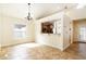 Bright dining room with tile floors and kitchen access at 749 Silver Birch Pl, Longwood, FL 32750
