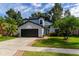 Two-story home with a landscaped yard at 749 Silver Birch Pl, Longwood, FL 32750
