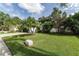 House with well-manicured lawn and palm trees at 749 Silver Birch Pl, Longwood, FL 32750
