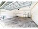Garage with shelving and washer/dryer hookups at 749 Silver Birch Pl, Longwood, FL 32750