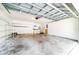 Garage with shelving and washer/dryer hookups at 749 Silver Birch Pl, Longwood, FL 32750