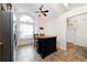Kitchen with island, stainless steel appliances, and wood cabinets at 749 Silver Birch Pl, Longwood, FL 32750