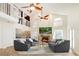 Spacious living room with fireplace, high ceilings, and comfortable seating at 749 Silver Birch Pl, Longwood, FL 32750