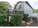 Landscaped side yard with a path leading to the backyard at 749 Silver Birch Pl, Longwood, FL 32750
