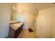 Bathroom with double vanity, large mirror, and shower at 873 Freedom Blvd, Davenport, FL 33837