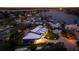 Luxury waterfront home with modern design, pool, and beautifully landscaped grounds at 8968 Bay Cove Ct, Orlando, FL 32819