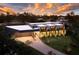 Luxury home with modern architecture, showcasing a sleek design and landscaped grounds at 8968 Bay Cove Ct, Orlando, FL 32819