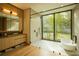 Spa-like bathroom with freestanding tub and walk-in shower at 8968 Bay Cove Ct, Orlando, FL 32819