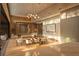 Modern dining room with a large table and contemporary lighting at 8968 Bay Cove Ct, Orlando, FL 32819