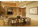 Elegant dining room with a long table and modern chairs at 8968 Bay Cove Ct, Orlando, FL 32819