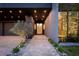 Inviting entryway with landscaping and modern lighting at 8968 Bay Cove Ct, Orlando, FL 32819