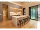 Spacious kitchen island with marble countertop and modern cabinetry at 8968 Bay Cove Ct, Orlando, FL 32819