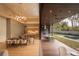 Open concept kitchen and dining area with indoor/outdoor flow at 8968 Bay Cove Ct, Orlando, FL 32819
