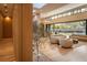 Open living space with large windows, high ceilings, and modern furnishings at 8968 Bay Cove Ct, Orlando, FL 32819