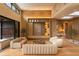 Spacious living room with modern furniture and built-in shelving at 8968 Bay Cove Ct, Orlando, FL 32819