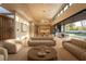 Open living space showcasing contemporary furniture and seamless indoor-outdoor flow at 8968 Bay Cove Ct, Orlando, FL 32819