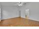 Bright bedroom with wood flooring and ceiling fan at 10828 Cherry Oak Cir, Orlando, FL 32817