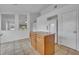 Kitchen island and view into adjacent living area at 10828 Cherry Oak Cir, Orlando, FL 32817