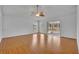 Living room with hardwood floors and sliding glass doors at 10828 Cherry Oak Cir, Orlando, FL 32817