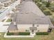 An aerial view showcasing the back of a row of townhouses at 1164 Pavia Dr, Apopka, FL 32703