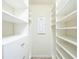 Walk-in closet with ample shelving and drawers at 1164 Pavia Dr, Apopka, FL 32703