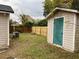 Backyard with shed and wooden fence at 118 Mandrake St, Orlando, FL 32811