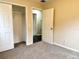 Bedroom with closet and access to another room at 118 Mandrake St, Orlando, FL 32811