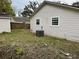 Rear view of house with AC unit at 118 Mandrake St, Orlando, FL 32811