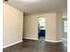 Bright living room with dark floors and neutral walls at 118 Mandrake St, Orlando, FL 32811