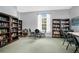 Community library with ample bookshelves and seating at 120 Casterton Cir, Davenport, FL 33897