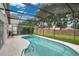 Screened-in pool and patio area, perfect for relaxation at 120 Casterton Cir, Davenport, FL 33897