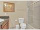 Bathroom with a shower, toilet and double vanity at 1361 Tuscan Ter # 7401, Davenport, FL 33896