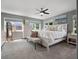 Spacious main bedroom with large windows and ceiling fan at 1375 Suffolk Rd, Winter Park, FL 32789