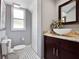 Modern powder room with dark vanity and vessel sink at 1375 Suffolk Rd, Winter Park, FL 32789