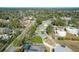 Aerial view of house, neighborhood, and surrounding area at 140 Rangeline Woods Cv, Longwood, FL 32750