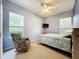 Cozy bedroom with a relaxing atmosphere and tiled floors at 140 Rangeline Woods Cv, Longwood, FL 32750