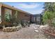 A stone pathway, fish pond, and patio area enhance this outdoor backyard space at 1721 Lakelet Loop, Oviedo, FL 32765